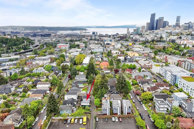 birds eye view of property with a city view