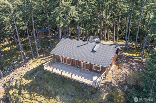 bird's eye view featuring a forest view