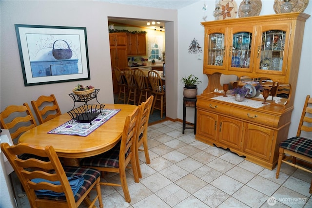dining room with light tile patterned floors