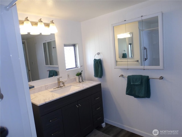 1308 263rd Pl, Ocean Park, WA 98640 - bathroom with vanity, a shower with door, and wood finished floors
