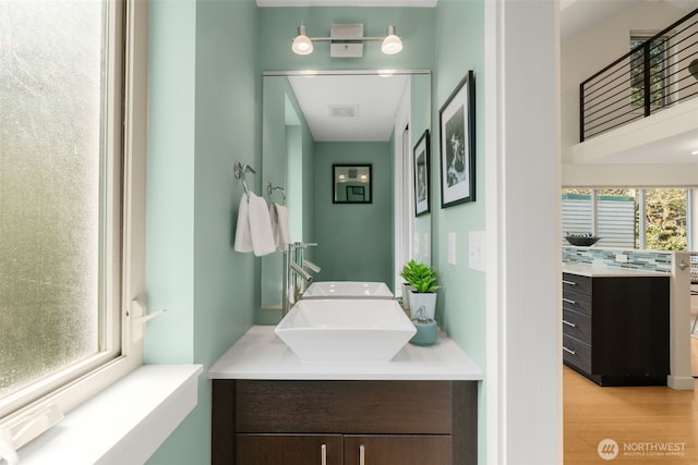 3924 S Brandon St Unit A, Seattle, WA 98118 - bathroom featuring vanity and wood finished floors