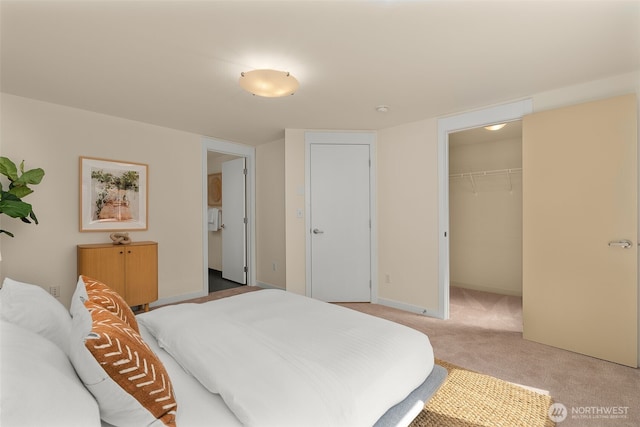 3924 S Brandon St Unit A, Seattle, WA 98118 - carpeted bedroom featuring a closet and a walk in closet