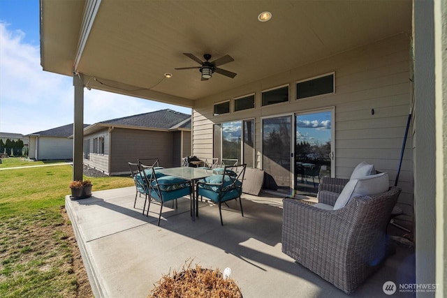 view of patio / terrace with outdoor dining space and ceiling fan