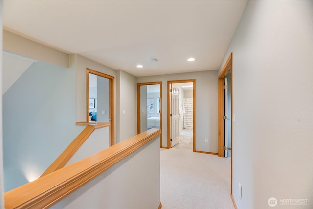9300 138th Ct NE, Redmond, WA 98052 - hallway featuring recessed lighting, baseboards, an upstairs landing, and light carpet