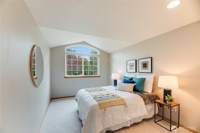 9300 138th Ct NE, Redmond, WA 98052 - bedroom with baseboards, light carpet, and lofted ceiling