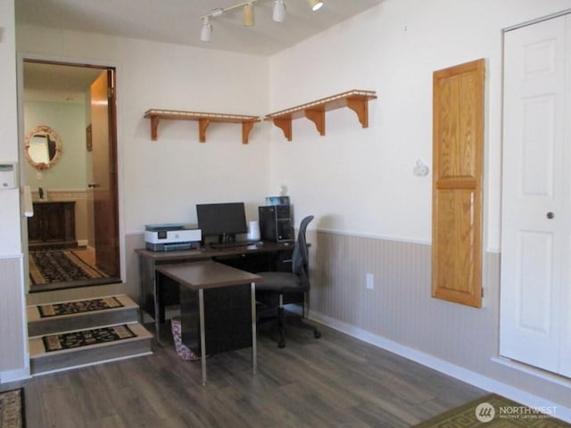 office featuring baseboards, wainscoting, and wood finished floors