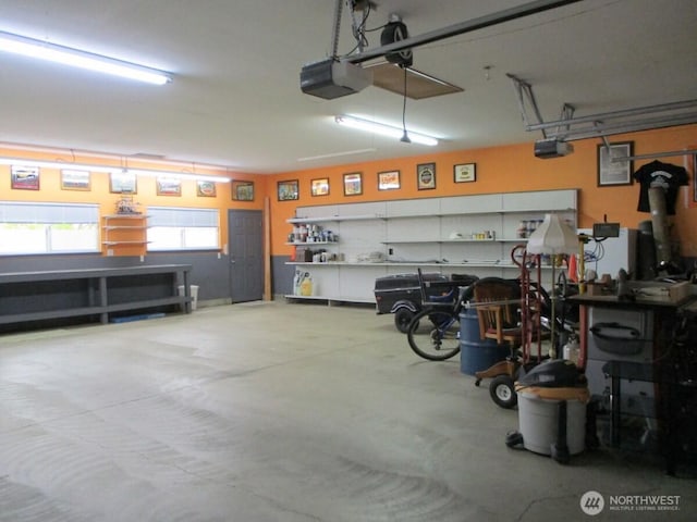 garage featuring a garage door opener