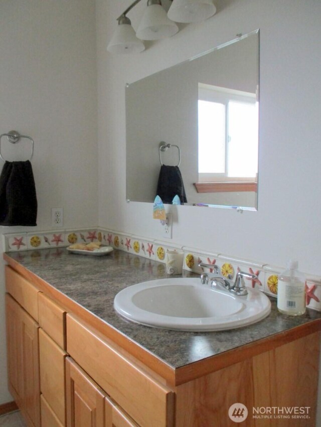 bathroom featuring vanity