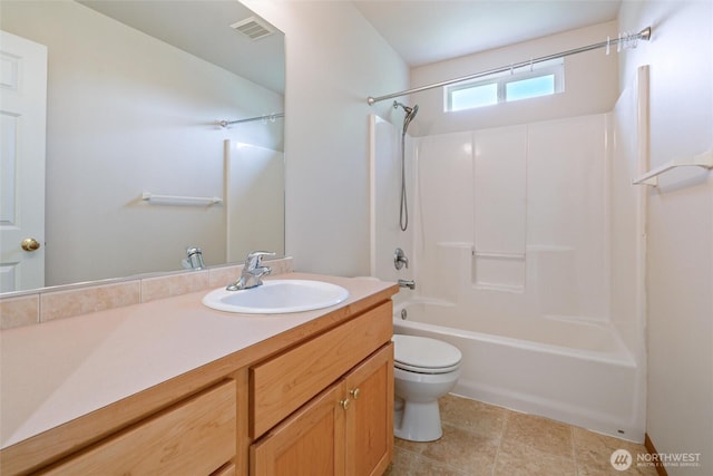 bathroom featuring visible vents, tub / shower combination, toilet, and vanity