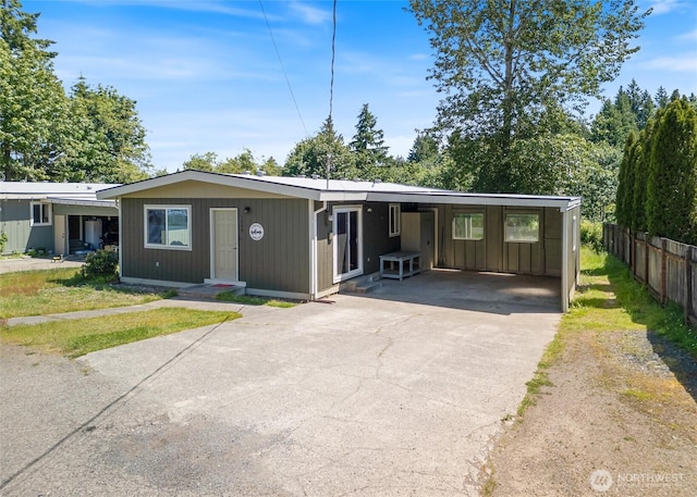 1209 Sherman Ave, Port Orchard, WA 98366 - view of front facade with driveway and a carport