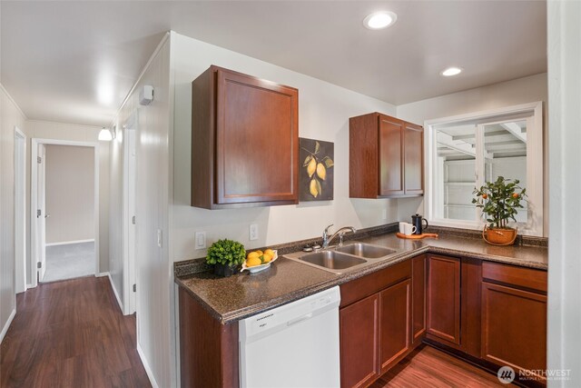1209 Sherman Ave, Port Orchard, WA 98366 - kitchen featuring white dishwasher, a sink, dark wood-type flooring, dark countertops, and recessed lighting