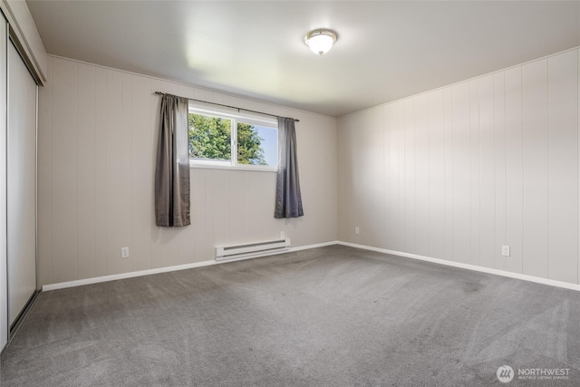 1209 Sherman Ave, Port Orchard, WA 98366 - empty room featuring baseboard heating, carpet flooring, and baseboards
