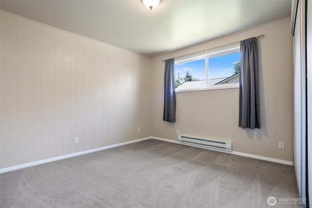1209 Sherman Ave, Port Orchard, WA 98366 - spare room with a baseboard radiator, carpet floors, and baseboards