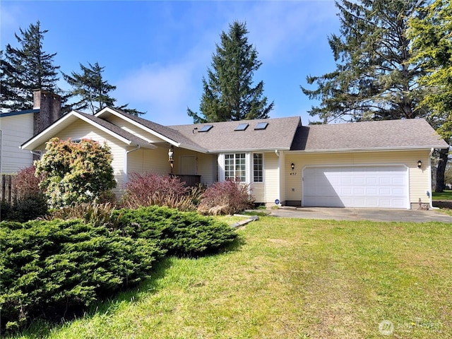 ranch-style house with an attached garage, driveway, and a front yard