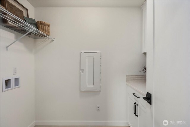 4118 220th Pl SE, Bothell, WA 98021 - clothes washing area featuring baseboards, hookup for a washing machine, and cabinet space