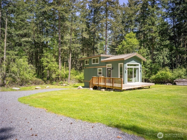 25 Eliza Ln, Lopez Island, WA 98261 - view of outdoor structure featuring gravel driveway and a forest view