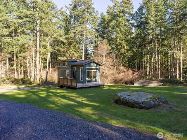 25 Eliza Ln, Lopez Island, WA 98261 - view of yard with a forest view and a deck