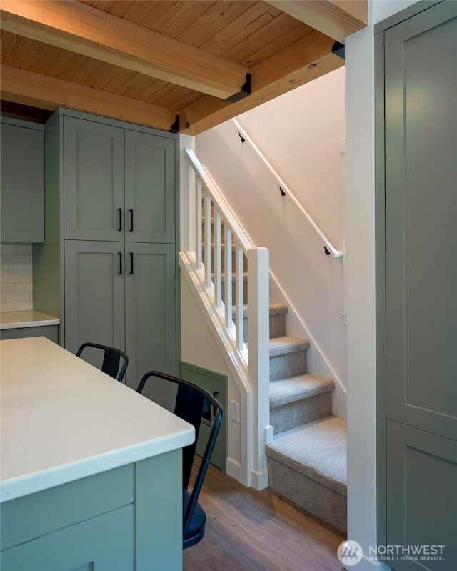 25 Eliza Ln, Lopez Island, WA 98261 - stairs featuring wood ceiling, beam ceiling, and wood finished floors
