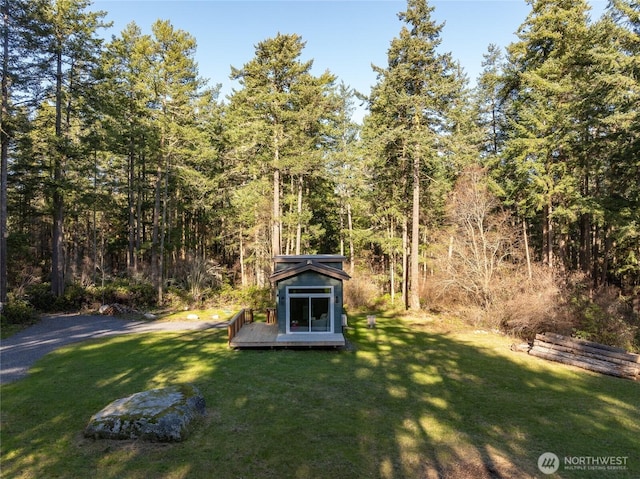 25 Eliza Ln, Lopez Island, WA 98261 - view of yard with an outdoor structure and a forest view