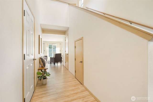 hallway featuring light wood-style floors