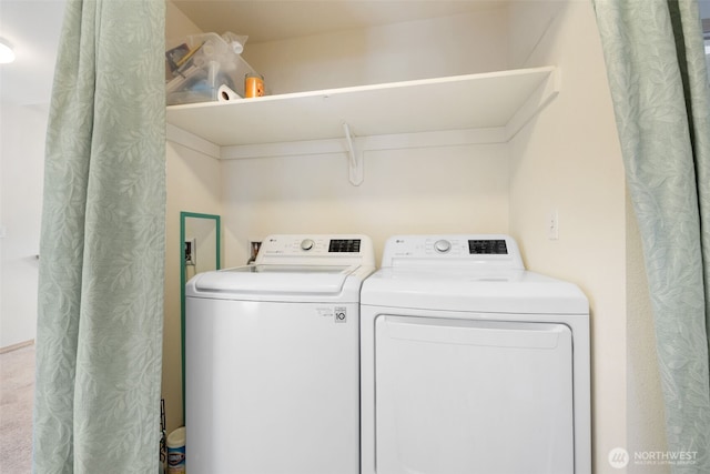 laundry room with separate washer and dryer