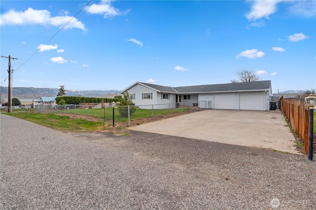 312 N Perry Ave, East Wenatchee, WA 98802 - ranch-style home with driveway, a garage, and fence