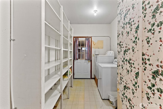312 N Perry Ave, East Wenatchee, WA 98802 - laundry area with light tile patterned floors, washer and dryer, and laundry area