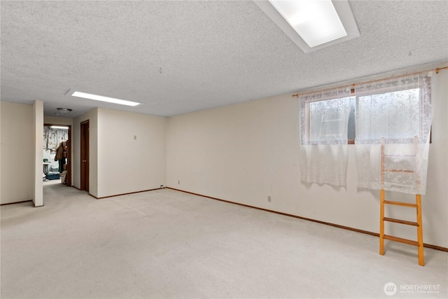 312 N Perry Ave, East Wenatchee, WA 98802 - basement featuring baseboards, carpet floors, and a textured ceiling