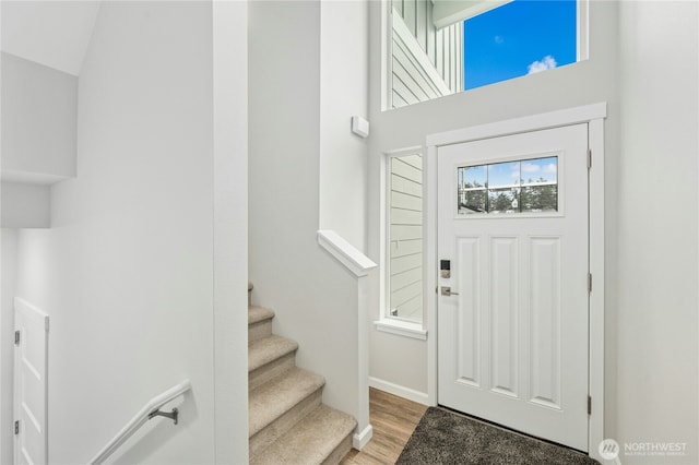27113 30th Pl S Unit 23, Kent, WA 98032 - foyer entrance featuring light wood-style flooring, baseboards, and stairs