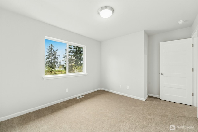 27113 30th Pl S Unit 23, Kent, WA 98032 - unfurnished room with light colored carpet, baseboards, and a smoke detector