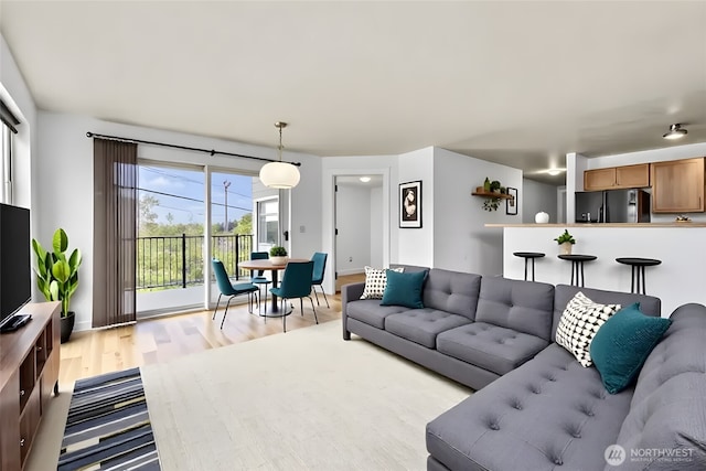 500 Elliott Ave W Unit 309, Seattle, WA 98119 - living area with wood finished floors and baseboards