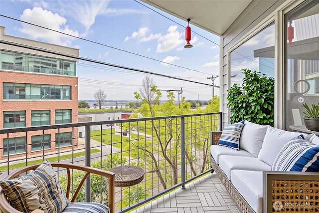 500 Elliott Ave W Unit 309, Seattle, WA 98119 - balcony featuring an outdoor living space