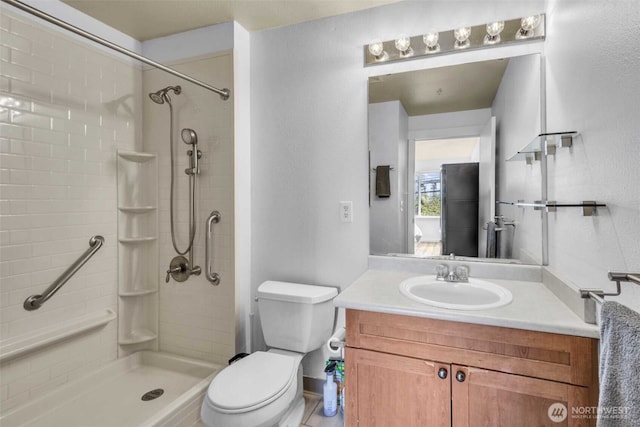 500 Elliott Ave W Unit 309, Seattle, WA 98119 - bathroom featuring toilet, vanity, and tiled shower