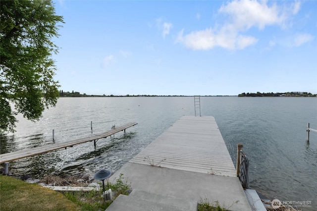 view of dock with a water view