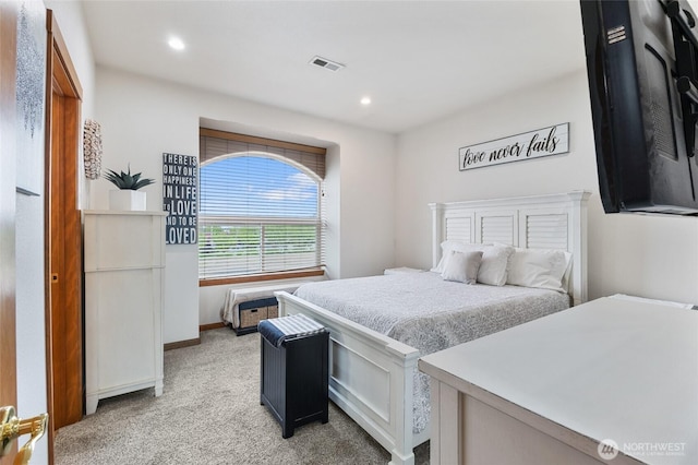 bedroom with visible vents, recessed lighting, baseboards, and light colored carpet