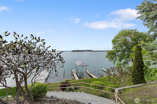 dock area featuring a water view and boat lift