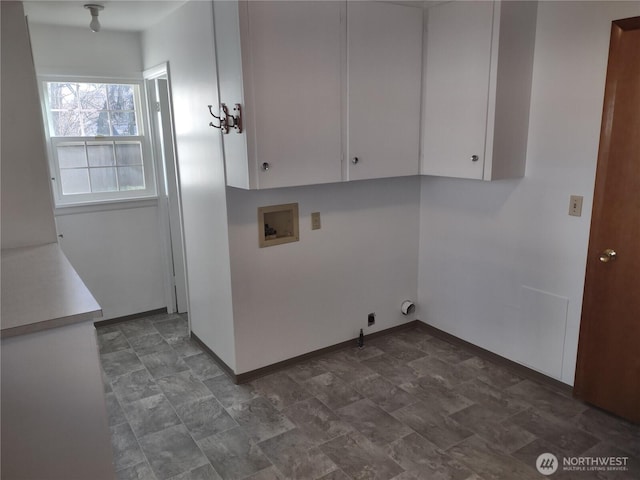 312 SE 9th St, College Place, WA 99324 - clothes washing area with hookup for an electric dryer, stone finish floor, baseboards, cabinet space, and hookup for a washing machine