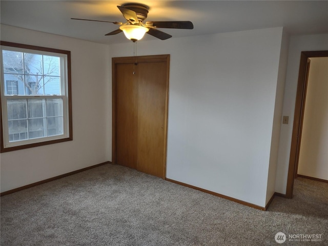 312 SE 9th St, College Place, WA 99324 - interior space with baseboards, a closet, carpet floors, and a ceiling fan