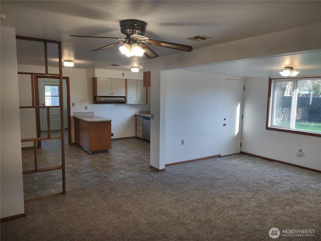 312 SE 9th St, College Place, WA 99324 - kitchen featuring dishwasher, a ceiling fan, carpet floors, and plenty of natural light