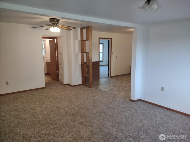 312 SE 9th St, College Place, WA 99324 - empty room featuring baseboards, carpet floors, and a ceiling fan