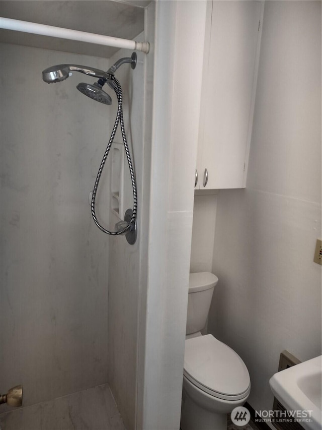 312 SE 9th St, College Place, WA 99324 - full bath with a sink, toilet, and a shower stall