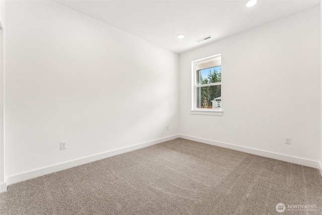 15710 210th Ave E Unit 311, Bonney Lake, WA 98391 - carpeted empty room with recessed lighting and baseboards