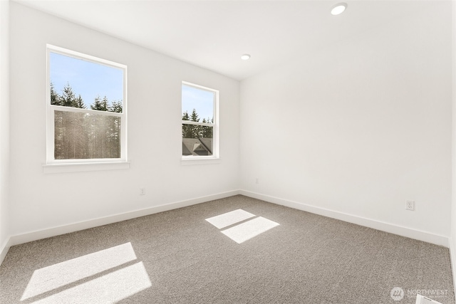 15710 210th Ave E Unit 311, Bonney Lake, WA 98391 - unfurnished room featuring carpet, baseboards, and recessed lighting