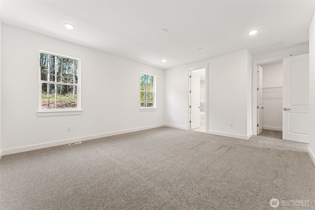 15710 210th Ave E Unit 311, Bonney Lake, WA 98391 - unfurnished room with recessed lighting, carpet flooring, and baseboards