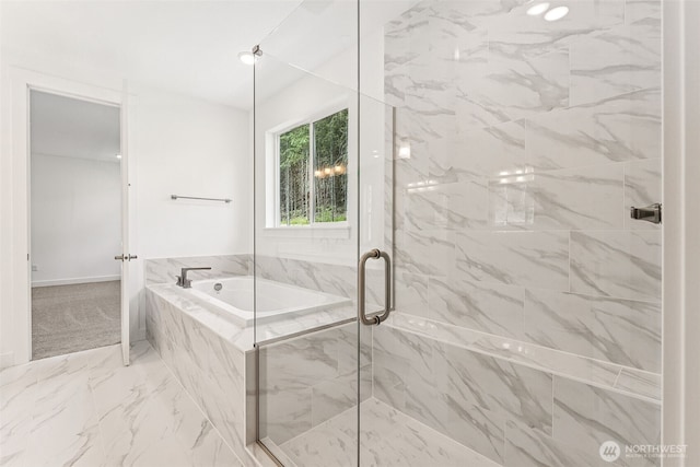 15710 210th Ave E Unit 311, Bonney Lake, WA 98391 - full bath featuring a marble finish shower, a bath, and marble look tile flooring