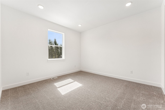 15710 210th Ave E Unit 311, Bonney Lake, WA 98391 - spare room with carpet floors, recessed lighting, and baseboards