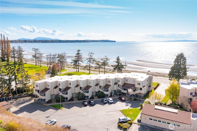 aerial view with a residential view and a water view