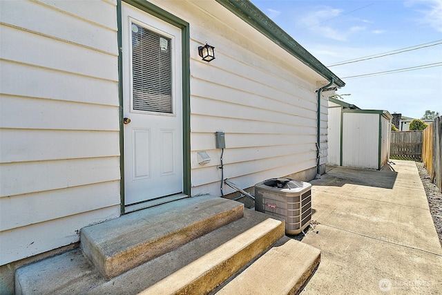 1496 E Mason Ave, Buckley, WA 98321 - property entrance with central AC unit and a patio
