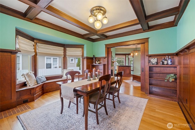 814 E Wright Ave, Tacoma, WA 98404 - dining area with coffered ceiling, beam ceiling, light wood-type flooring, and a chandelier