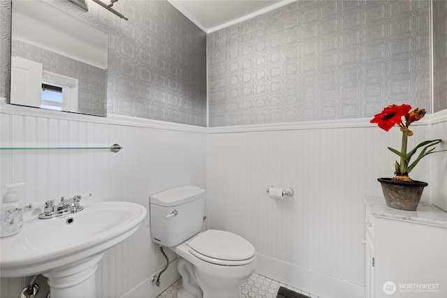814 E Wright Ave, Tacoma, WA 98404 - half bathroom featuring wainscoting and tile patterned floors